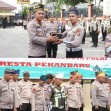 Kapolresta Pekanbaru Pimpin Apel Launching Penggunaan Tanjak dan Selempang bagi Anggota Polri bersama LAM Riau