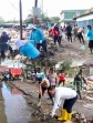 Wabup Pelalawan bersama Personil TNI-Polri dan Pramuka  Turun Bersihkan Sampah di Pasar Baru