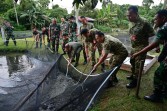 Lanud Roesmin Nurjadin Pekanbaru Panen Satu Ton Ikan Lele